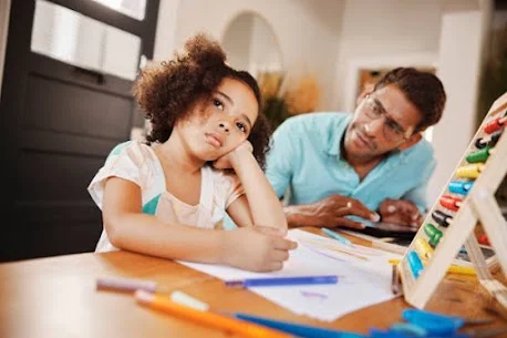 Young girl looking distressed while a parent provides support, showing child and adolescent depression care in Houston, TX.
